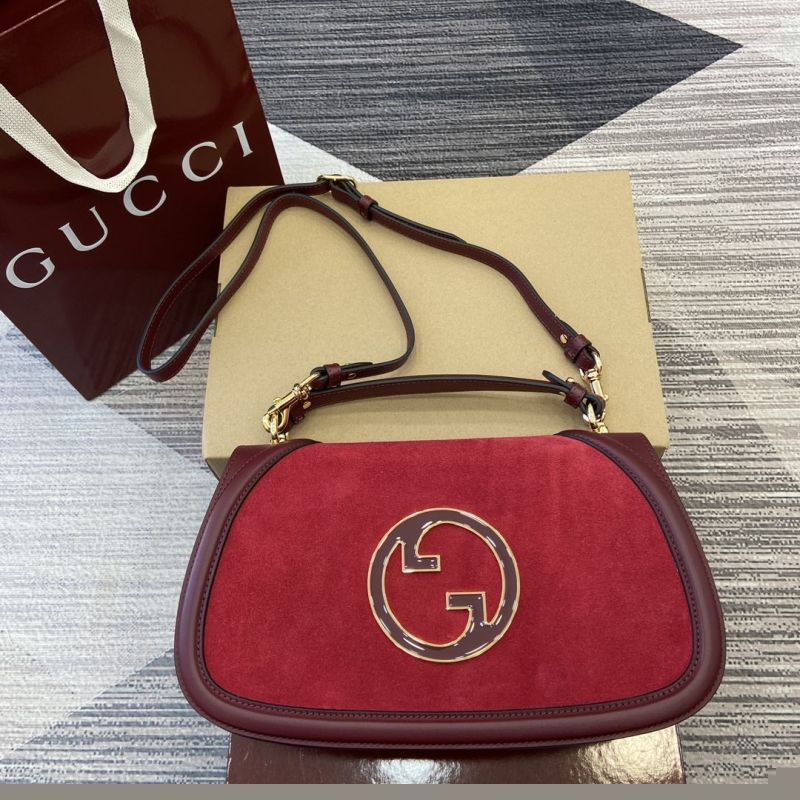 G*u*i top handle bags